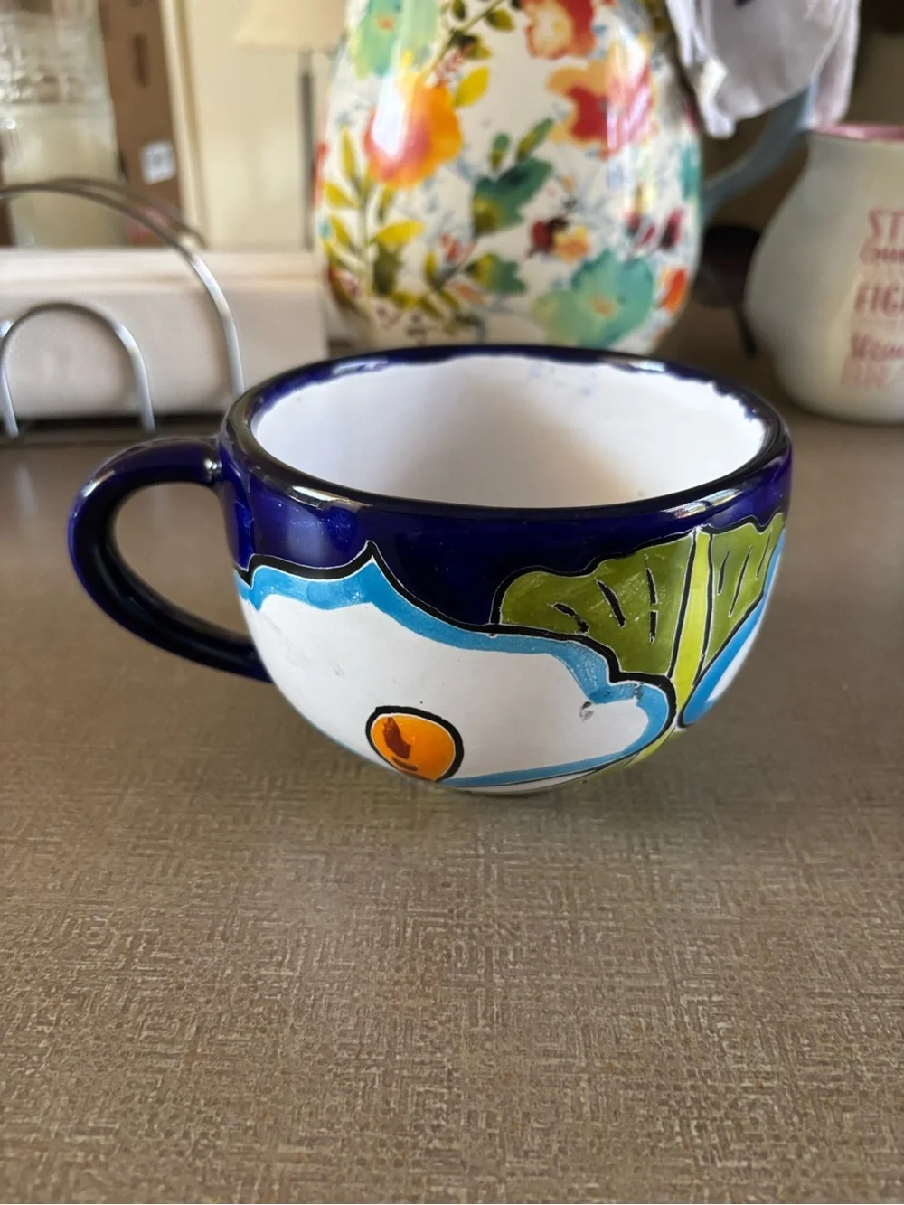 Hand-Painted Blue and White Floral Ceramic Cup